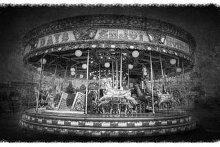 A faded old picture of a haunted carousel