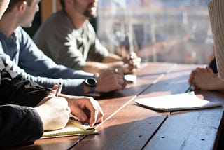 A group of colleagues sitting together at a training session