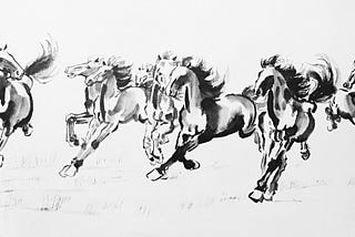 a brush drawing of four galloping horses