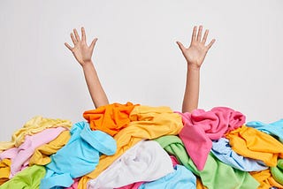 pile of clothes — https://t3.ftcdn.net/jpg/04/40/53/90/360_F_440539033_2a76yiN1cB1pEOT2njwYkVgIrLCO0of3.jpg
