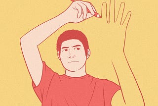 man drawing his own hand