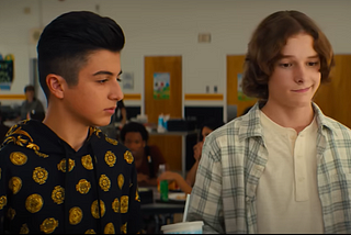 From left to right: Koosh (Bardia Seiri) and Benj (Mason Thames) try to hold a conversation with girls. Credit: YouTube/Netflix