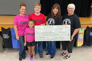 The CARE Project Donates $5,000 to Children Surviving Breast Cancer