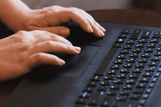 Typing on a laptop keyboard