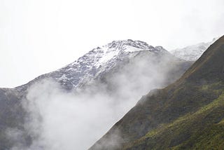 Photo of mountains with cloud obscuring the distance