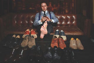 Why You Never Wear Socks With A Three-Piece Suit