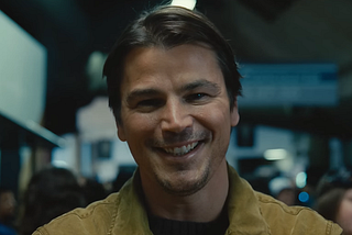 Josh Hartnett as Cooper smiles at the camera. Is there something unnerving about it?