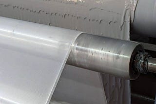 The PVC Coating Process: Creating High-Performance Mesh Fabrics