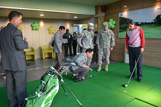 An indoor golf facility offering golf simulator technology for testing different putters