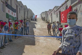 Turkish charities are building houses for Syrian families.