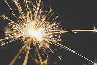 Sparklers shine as we set New Years Resolutions that will both burn out.