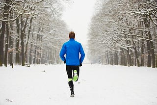 Man running in the snow