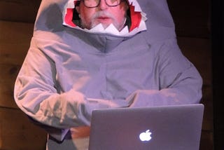 Photo of Andrew Marlton (aka ‘First Dog on the Moon’) dressed as a shark, because that’s apparently that’s a thing Tasmanians do.