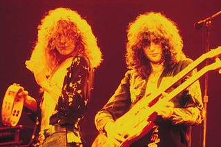 two iconic 1970s musicians playing their stuff (music of the 1970s)