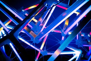 An abstract glowing line pattern created by pipes and spokes