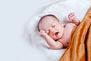 Why Is My Noisy/ Grunting/ Snoring Infant Making Weird Sounds in Their Sleep?