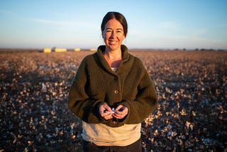 Fibershed Executive Director Rebecca Burgess standing in a cotton field