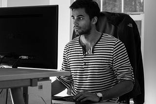 Rohan Bhobe working on his computer