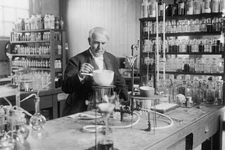 Thomas Edison doing some experiment in lab