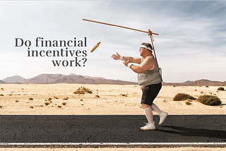 Man running after dangling carrot. Do financial incentives work?