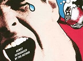 Pet Sematary cover: a man’s face with a tear falling from his eye and a bloody cat pictured in a thought bubble alongside him