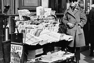 vintage photo of pulp magazine news stand in early 1900s