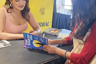 Tahmina Watson and Priyanka Chopra Exchange Books at SXSW