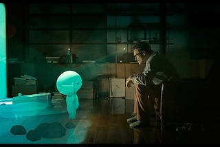 Image of man looking at hologram from the movie Her released in 2013