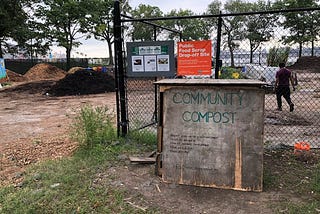 Volunteers celebrate World Habitat Day at the East River Compost Yard