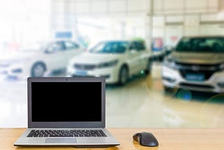 Computer at a car sales yard