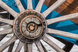 A close-up photo of a wheel with spokes