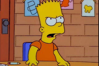 Bart Simpson stands from his desk in defiance.