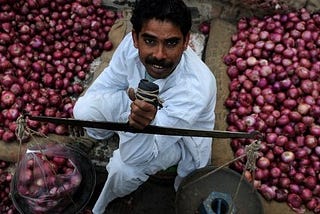 Why does onion burn a hole in the common man’s pocket year by year?