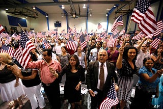 Immigrants take the oath of Citizenship