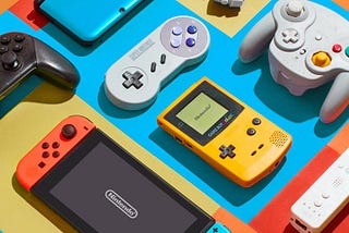 A color photo by Brandon Hill of a colorful still life arrangement of Nintendo products.