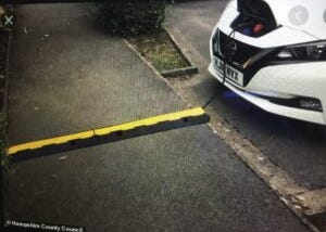 EV charging using cable across a sidewalk