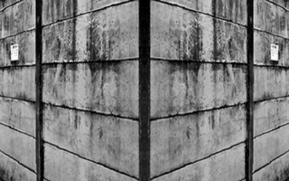 double sided image of concrete fence