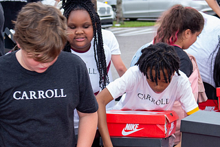 Billionaire Patrick Carroll Treats Chicago Kids in Need to 600 Sneakers at Kickz for Kids —…