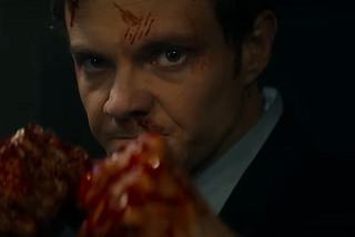 Jack Quaid as Nathan “Novocaine” Caine with bloody fists raised.