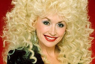 Dolly Parton, sporting very big hair circa 1980s.