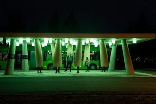 A bus approaches the prototype bus station “Station of Being” in Umeå, Sweden at night