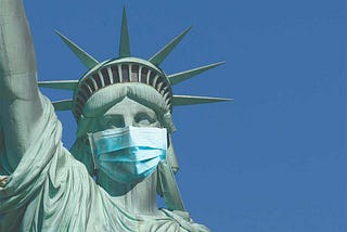 Statue of Liberty wearing a disposable mask.