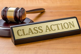 What is the job of a class action lawyer?