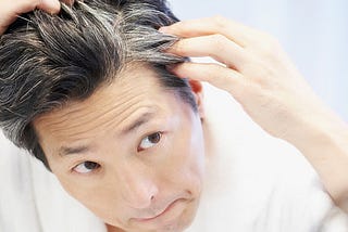 A vitamin shortage could be the cause of grey hair