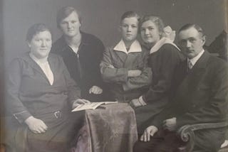 My grandmother surrounded by her family