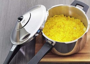 stovetop pressure cooker full of rice