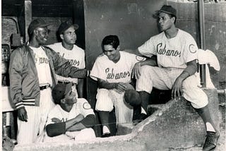 CROSSING BRIDGES: A HISTORY OF CUBAN BASEBALL DEFECTION TO THE UNITED STATES