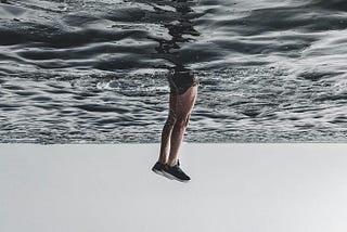 Person Diving on Body of Water — Somewhat relating to the movie Inception