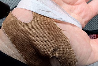 Close-up of a bandaged hand