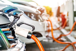 Collision Course: Automakers & Utilities in the EV Age